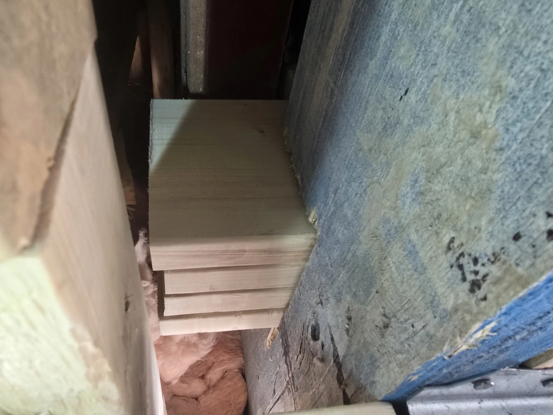Close view of timber blocking and bearing between existing framing members