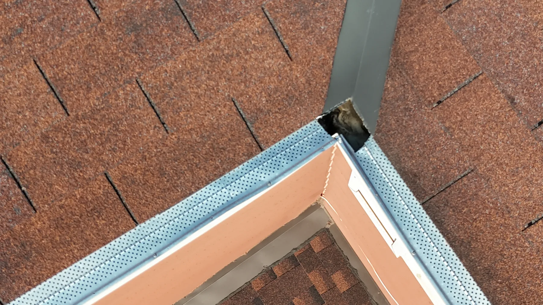 Roof flashing and penetration photographed by drone